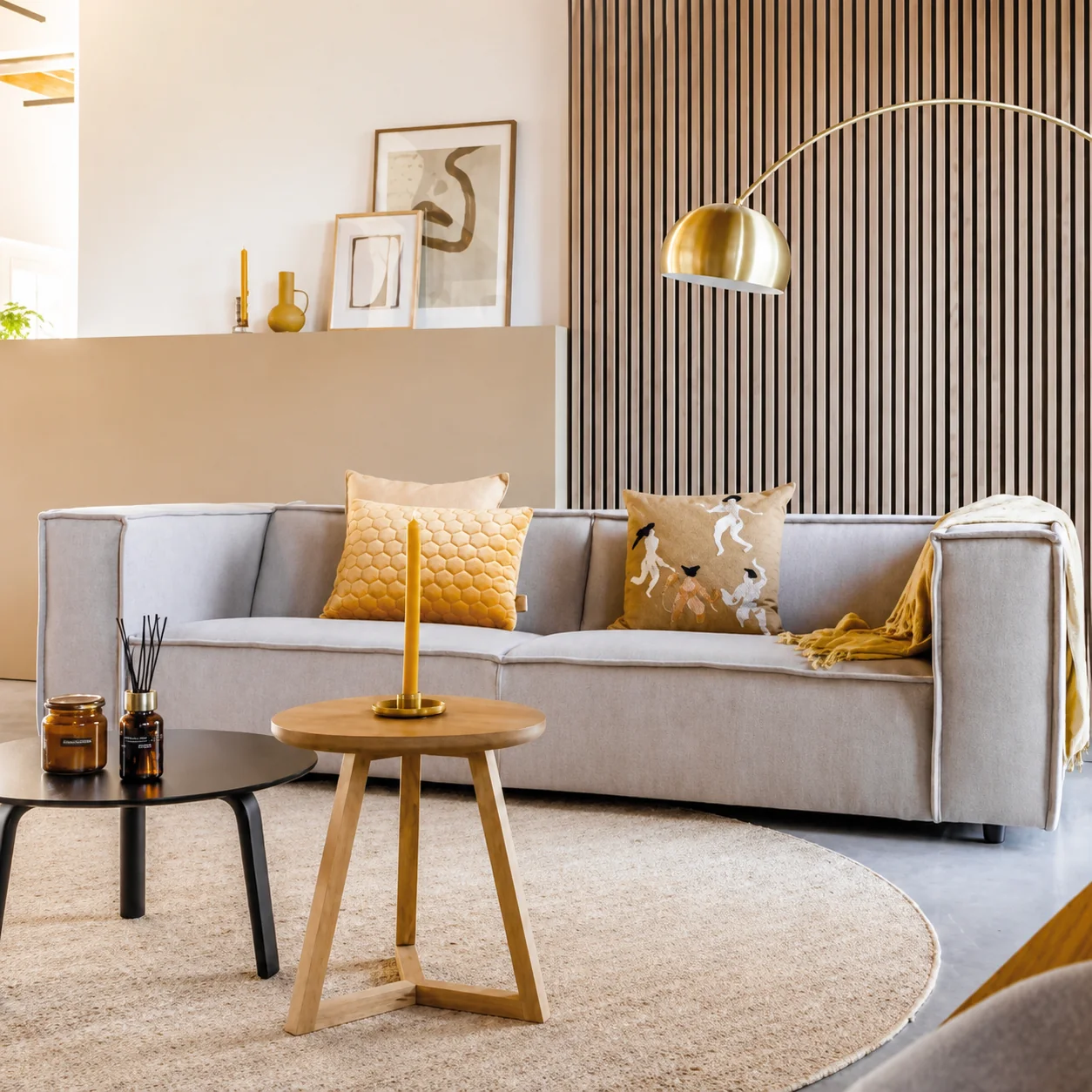 Warm living room with natural wood slat feature wall